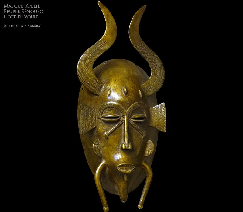 Art africain - Masque Sénoufo kpélié bicorne, en métal - Sénoufos - Côte d'Ivoire