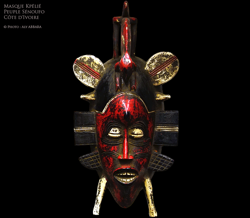 Art africain - Masque Sénoufo kpélié polychrome (noir, rouge et blanc) surmonté d'un lézard - Sénoufos - Côte d'Ivoire