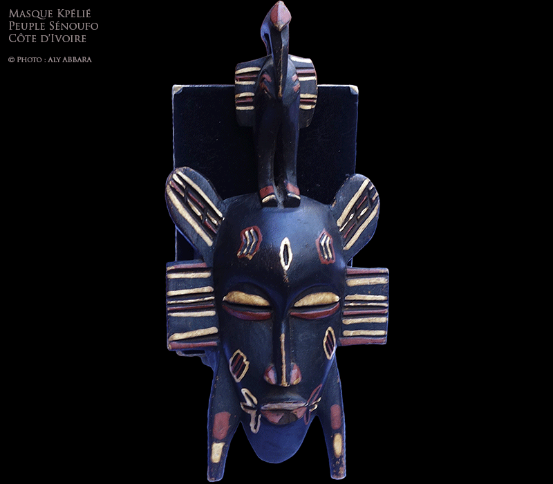 Art africain - Masque Sénoufo kpélié polychrome (noir, rouge et blanc) surmonté d'un oiseau - Sénoufos - Côte d'Ivoire