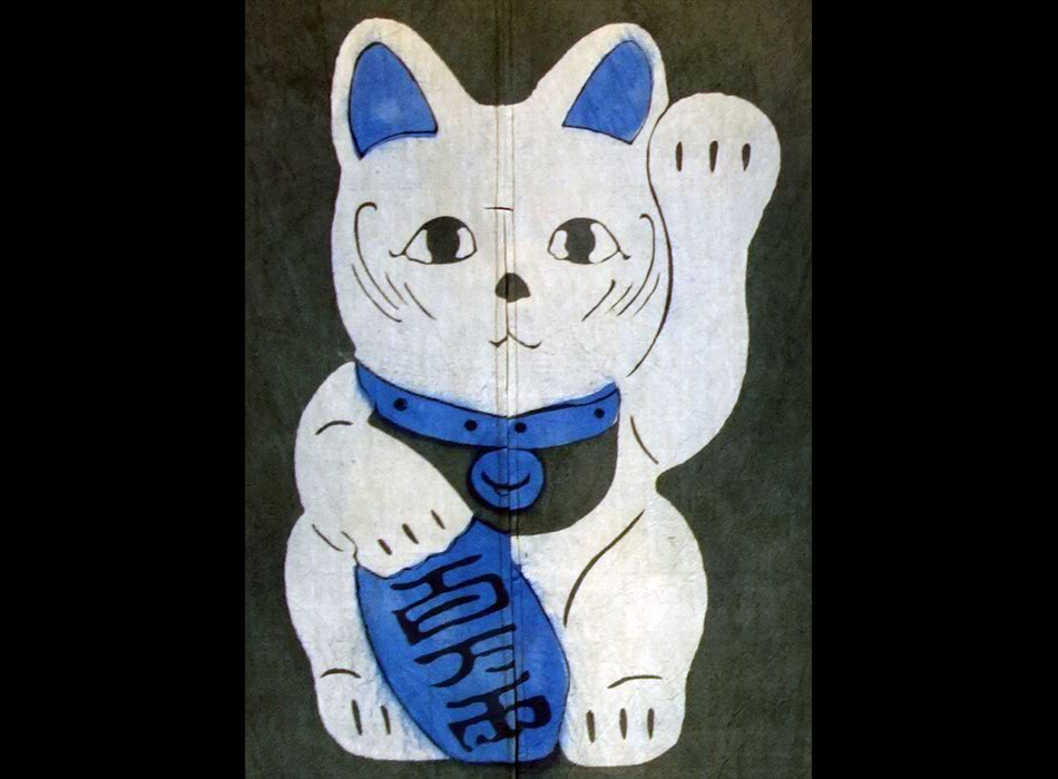 Maneki-Neko : dessin sur tissu à l'entrée d'une boutique de soins pour chats